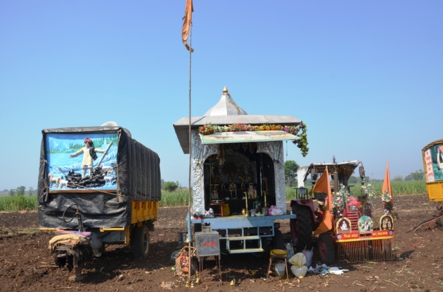 The movable temple and vehicles accompanying the sacred herds.